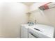 A laundry room is equipped with a washer and dryer at 2530 Girvan Dr, Fuquay Varina, NC 27526
