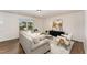 Bright living room with stylish seating and a chic media console at 2530 Girvan Dr, Fuquay Varina, NC 27526