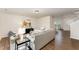 Spacious living area with an open floor plan and elegant decor, perfect for entertaining at 2530 Girvan Dr, Fuquay Varina, NC 27526