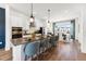 Modern kitchen with center island, granite countertops, and stainless steel appliances at 2810 Kempthorne Rd # 60, Cary, NC 27519