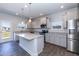 Modern kitchen with stainless steel appliances, granite countertops, and an island at 301 New Twin Br Ct, Smithfield, NC 27577