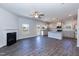 Spacious living room with an adjacent modern kitchen providing an open and airy atmosphere at 301 New Twin Br Ct, Smithfield, NC 27577