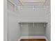 Walk-in closet offering ample storage with shelves and hanging rods at 307 Pine Tree Rd, Oxford, NC 27565