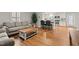 Hardwood floors in an inviting living room and an open layout to the kitchen at 307 Pine Tree Rd, Oxford, NC 27565