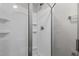 The shower features a sleek design with glass doors and modern fixtures at 307 Pine Tree Rd, Oxford, NC 27565