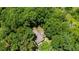 Overhead image of the property and its serene, wooded setting at 3216 Green Valley Dr, Sanford, NC 27330