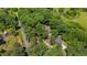 Aerial view of the property highlighting the home's location on a spacious, wooded lot at 3216 Green Valley Dr, Sanford, NC 27330