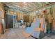 Basement space with unfinished walls and an assortment of tools and building materials at 3216 Green Valley Dr, Sanford, NC 27330