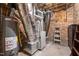 Basement utility featuring water heater and HVAC system at 3216 Green Valley Dr, Sanford, NC 27330