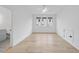 Bright bedroom boasts light hardwood floors, fresh paint, and great natural light from the windows at 3407 Churchill Rd, Raleigh, NC 27607
