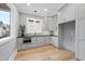 Charming butler's pantry with gray cabinets, stainless steel microwave, and a window view at 3407 Churchill Rd, Raleigh, NC 27607