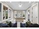 Bright home office featuring a neutral palette, natural light, and elegant furnishings at 3407 Churchill Rd, Raleigh, NC 27607