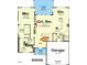 First floor plan displaying a kitchen, great room, main bedroom, and garage layout at 3801 Peaceful Creek Trl, Zebulon, NC 27597