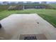 Expansive backyard features a patio, tiered garden, and a landscaped area for relaxed outdoor enjoyment at 400 Access Dr, Youngsville, NC 27596