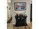 Stylish home bar area featuring wine and glass storage, plus elegant decor at 400 Access Dr, Youngsville, NC 27596
