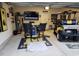The garage space has a TV, bar, seating, golf cart, and Michigan decor at 400 Access Dr, Youngsville, NC 27596