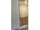 Entryway featuring hardwood floors, white trim, and a bright doorway leading into another room at 400 Access Dr, Youngsville, NC 27596