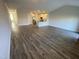Expansive living room featuring hardwood floors and ample space for entertaining and Gathering gatherings at 400 Access Dr, Youngsville, NC 27596