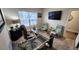 Well-lit home office with ample natural light and an executive desk for a productive workspace at 400 Access Dr, Youngsville, NC 27596