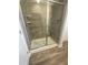 The bathroom features a modern shower with a glass door and tile surround at 400 Access Dr, Youngsville, NC 27596