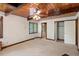 Empty bedroom with window, ceiling fan, and an ensuite bathroom at 4501 Zebulon Rd, Zebulon, NC 27597