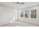 Bedroom featuring abundant natural light, neutral decor, ceiling fan, and comfortable carpeting at 4607 Mint Leaf Ln, Raleigh, NC 27612