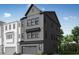 Modern two-story home featuring gray siding, multiple windows, and attached two-car garage at 4611 Mint Leaf Ln, Raleigh, NC 27612