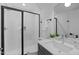 Contemporary bathroom with a sleek glass-enclosed shower and stylish vanity at 5049 Lundy Dr # 101, Raleigh, NC 27606