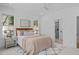 Serene main bedroom featuring soft lighting, a bed with plush pillows and ensuite bathroom at 5049 Lundy Dr # 101, Raleigh, NC 27606