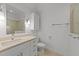 Bathroom featuring a vanity with drawers and an enclosed toilet at 5109 Knaresborough Rd, Raleigh, NC 27612
