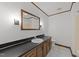 Bathroom with a sink and cabinet combo and tile flooring at 5109 Knaresborough Rd, Raleigh, NC 27612