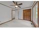 Spacious bedroom features a closet and wood trim at 5109 Knaresborough Rd, Raleigh, NC 27612