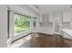 Eat-in kitchen area with large windows providing ample natural light and backyard views at 5109 Knaresborough Rd, Raleigh, NC 27612
