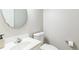 This bathroom features a modern toilet, sink, and fixtures at 540 W Juniper Ave, Wake Forest, NC 27587