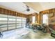 Spacious garage with natural light, a workbench, and ample space for storage and activities at 540 W Juniper Ave, Wake Forest, NC 27587