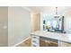 Kitchen island features quartz countertops and stainless steel appliances in a modern setting at 540 W Juniper Ave, Wake Forest, NC 27587