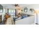Bright living room with hardwood floors, a fireplace, and a comfortable couch for relaxing at 540 W Juniper Ave, Wake Forest, NC 27587
