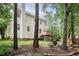 Spacious backyard view, featuring a deck and patio for outdoor enjoyment at 5629 Yates Garden Ln, Raleigh, NC 27606