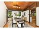 Modern dining room with a stylish table, comfortable seating, and natural light at 612 Greenwood Rd, Chapel Hill, NC 27514