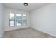 Bedroom with large windows providing ample natural light at 628 Denhoff Dr, Cary, NC 27519