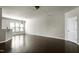 Open-concept living area with hardwood floors, natural light, and eat-in kitchen at 628 Denhoff Dr, Cary, NC 27519