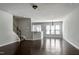 Open-concept living area featuring hardwood floors, neutral walls, and staircase to the upper level at 628 Denhoff Dr, Cary, NC 27519