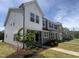 New townhomes feature modern architectural design and beautiful landscaping at 6441 Granite Quarry Dr, Raleigh, NC 27610