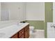 Bathroom with a white sink and dark wood cabinets at 71 Havistock Ct, Cameron, NC 28326