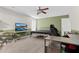 A bedroom with a ceiling fan and desk at 71 Havistock Ct, Cameron, NC 28326