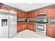 Close up of updated kitchen appliances, countertops, and custom backsplash at 71 Havistock Ct, Cameron, NC 28326