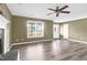 Inviting living room with modern floors, a window, and neutral color walls at 71 Havistock Ct, Cameron, NC 28326