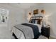 A teenager's bedroom includes a unique basketball decor theme and a comfortable black and gray bed at 711 Chandler Stone Dr, Zebulon, NC 27597