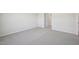 Bright bedroom featuring neutral walls, carpeted floors and walk-in closet at 713 Chandler Stone Dr, Zebulon, NC 27597