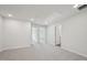 Bedroom with neutral carpet, recessed lights, and multiple doorways at 713 Chandler Stone Dr, Zebulon, NC 27597
